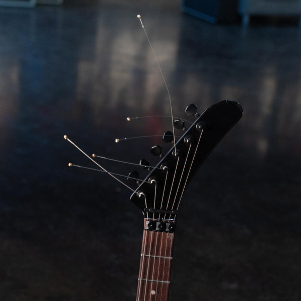 FENDER TOM MORELLO'S "ARM THE HOMELESS" GUITAR